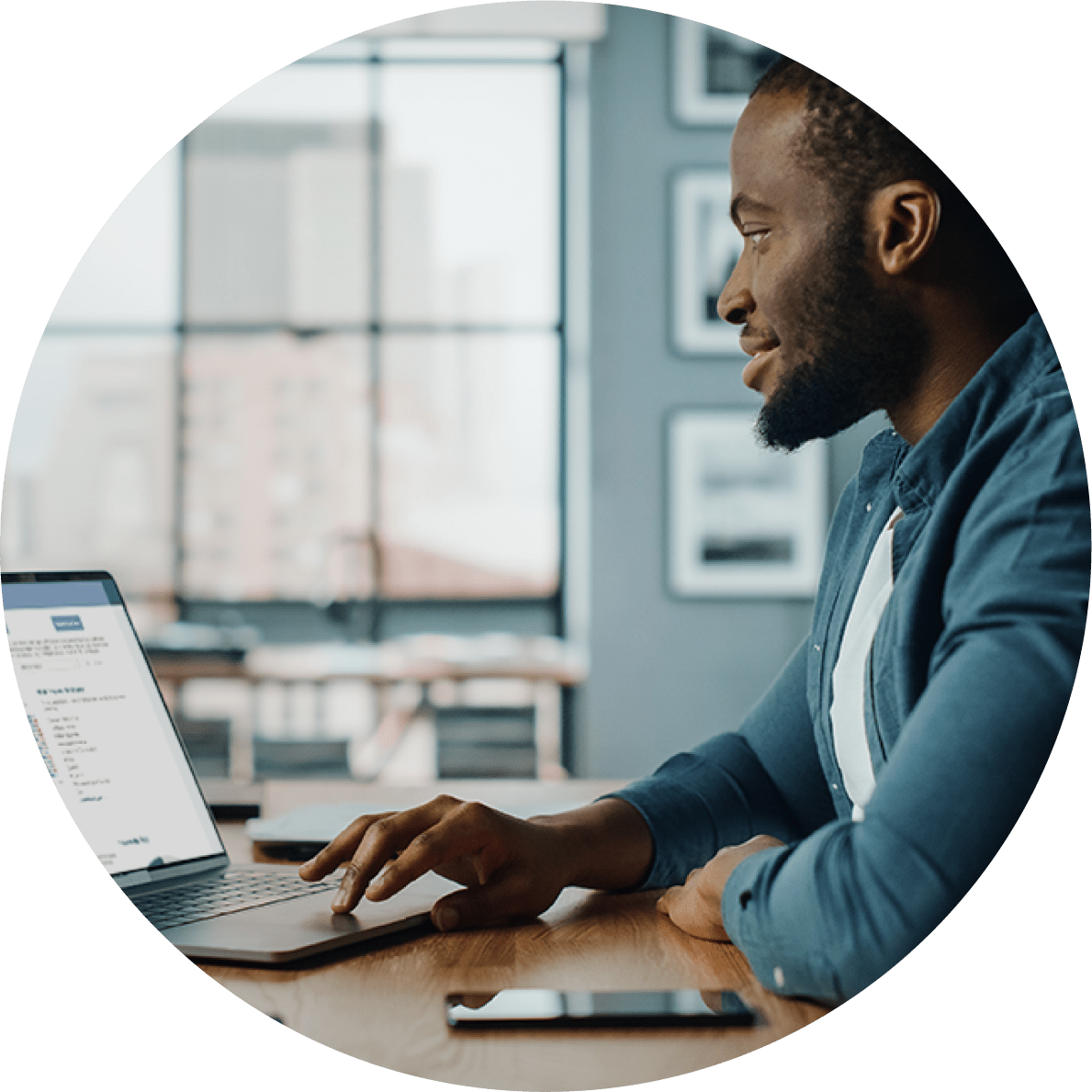 Man looking at computer at desk